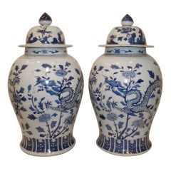 A Pair Of Blue & White Porcelain Jars With Covers