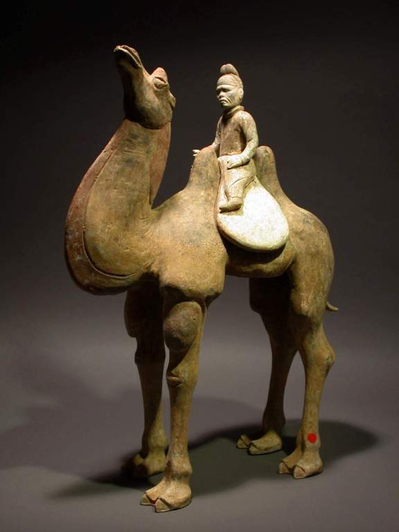 A very fine and superbly modeled pottery statue of standing camel with a mongolian rider, early Tang dynasty 618-907, comes with Oxford authentication TL test certificate. Oxford TL test sample number C102s60.