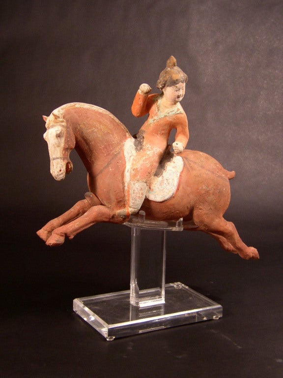 A superb and playful pottery statue of lady polo player with original pigment, Tang Dynasty 618-907, comes with Oxford authentication TL test certificate. Oxford TL test sample number 866h60.