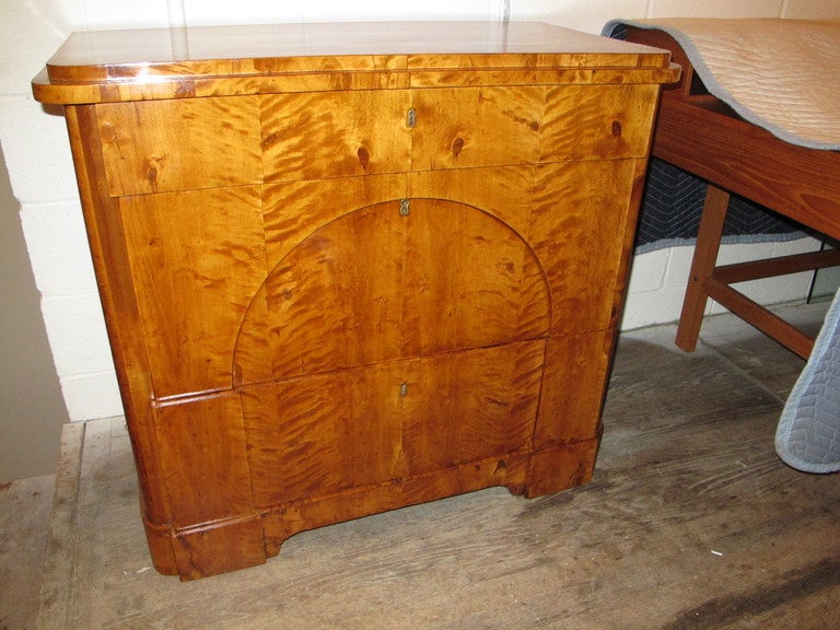 Biedermeier tiger maple three drawer commode