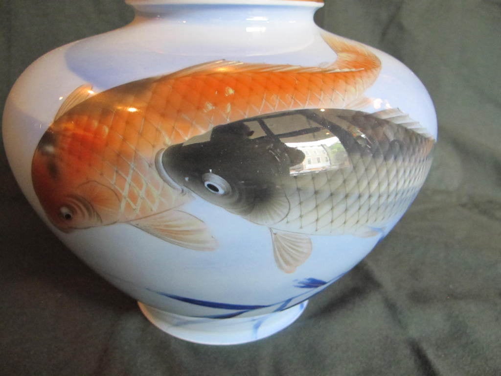 Large porcelain Fukagawa vase with koi fish.