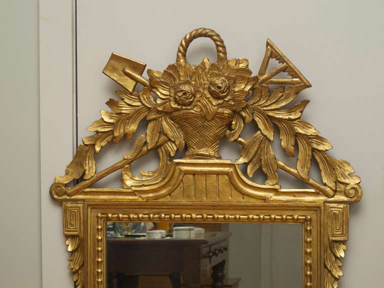 Pair of French carved gilt wood mirrors