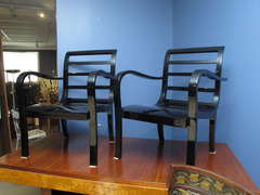 Pair of black lacquer armchairs