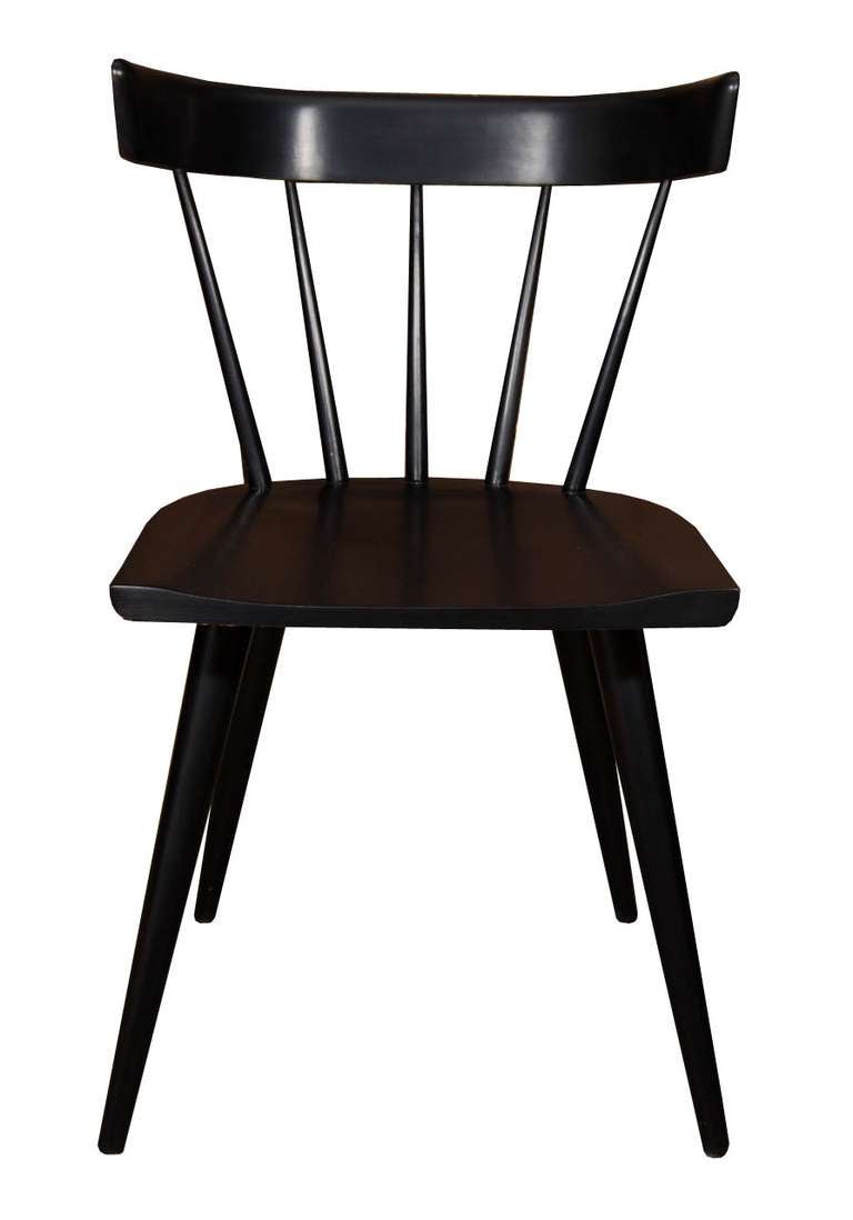 Paul McCobb Planner Group solid maple dining chairs, circa 1950s. Solid wood construction fully restored in a satin black lacquer finish. Classic Mid-Century chair detailing with solid construction makes for a timeless design that works in many