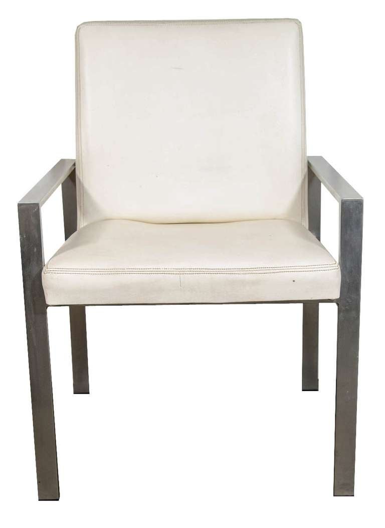 Architectural dining chairs constructed of aluminium flat bar and upholstered seats