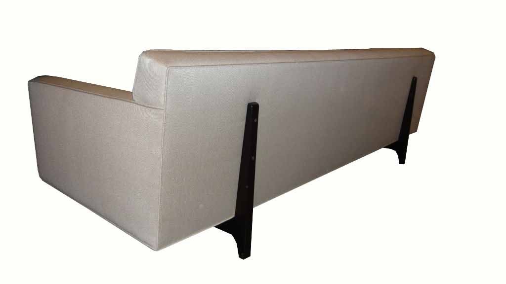 Edward Wormley for Dunbar tufted sofa on a solid mahogany cradle base Ca.1960 in pristinely restored condition.Sofa has been completely restored and reupholstered and original Dunbar decking has been professionally cleaned and refitted to sofa deck.