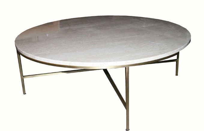 Mn originals brass X base cocktail table with polished Italian travertine top. Antiqued satin brass base is fabricated from square tubular stock with a interior X stretcher detail and round disc feet.

Custom orders have a lead time of 10-12 weeks