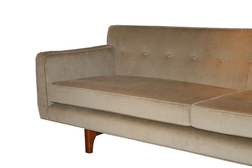 Edward Wormley for Dunbar sofa finely restored in a cotton velvet corduroy fabric.Sculpted solid wood mahoghany base which is seen on the backside detail.Fully restored and reupholstered in a cotton velvet corduroy fabric.<br />
This item is