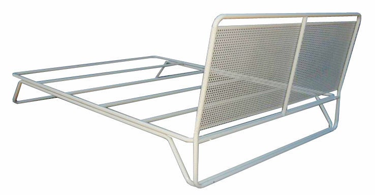 Mn Originals platform bed frame constructed of tubular steel and perforated steel sheeting material. High-gloss powder-coated finish is highly durable. Two-piece assembly takes minutes to complete. Shown in queen-size. 

Custom orders have a lead