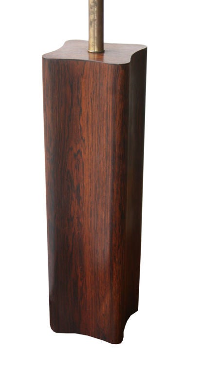 Rare Rosewood table lamp by Jens Quistgaard for Dansk Ca. 1950s.Beautiful rosewood base with brass fixture and milk glass globe that accepts a linen shade.

This item is located at our 1stdibs booth in the New York Design Center at 200 Lexington