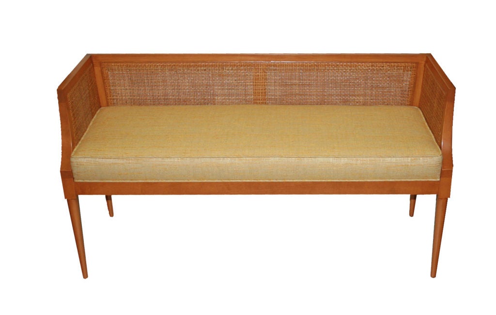 Mn Originals solid maple bench with inset natural caning fitted with a tight upholstered seat.

COM requirements: 3 yards 
5% up-charge for contrasting fabrics and or welting
COL Requirements: 60 sq. feet
5% percentage up-charge for all COL or