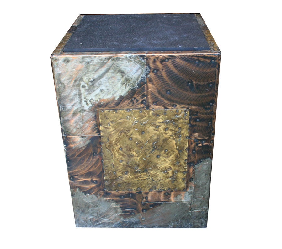 Paul Evans patchwork side table Ca. 1970's with original Slate top.Copper, Bronze an Pewter Patchwork Side Table with a patinated finish an inset slate top.

This item is located at our 1stdibs booth in the New York Design Center at 200 Lexington