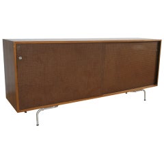 Walnut Credenza with Pegboard Sliding Doors by Maurice Martine