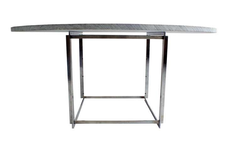 PK 54 round dining table with steeled rolled marble top and square chromium plated steel frame. Designed by Poul Kjaerholm ,Denmark. Includes six 15-inch maple extension leaves that extend the diameter to 85