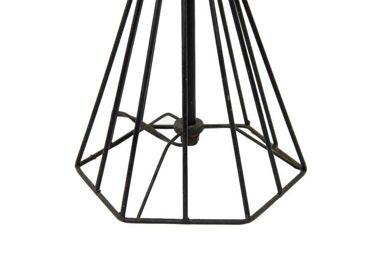 Mid Century Cage Hurricane Table Lamps.Iron cage base supports glass hurricane style shade.
