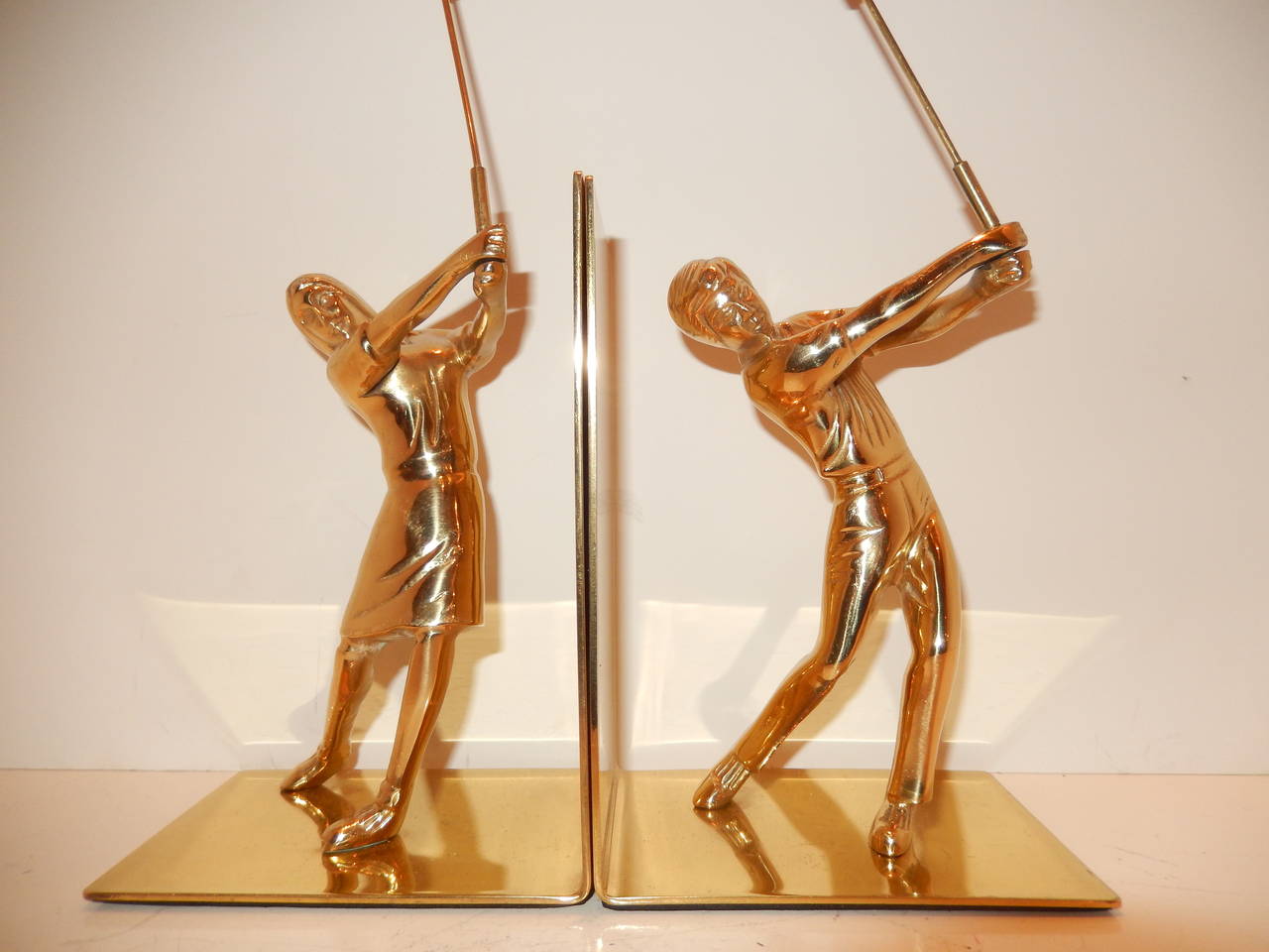 Cast Pair of Art Deco Male and Female Golfers Bookends