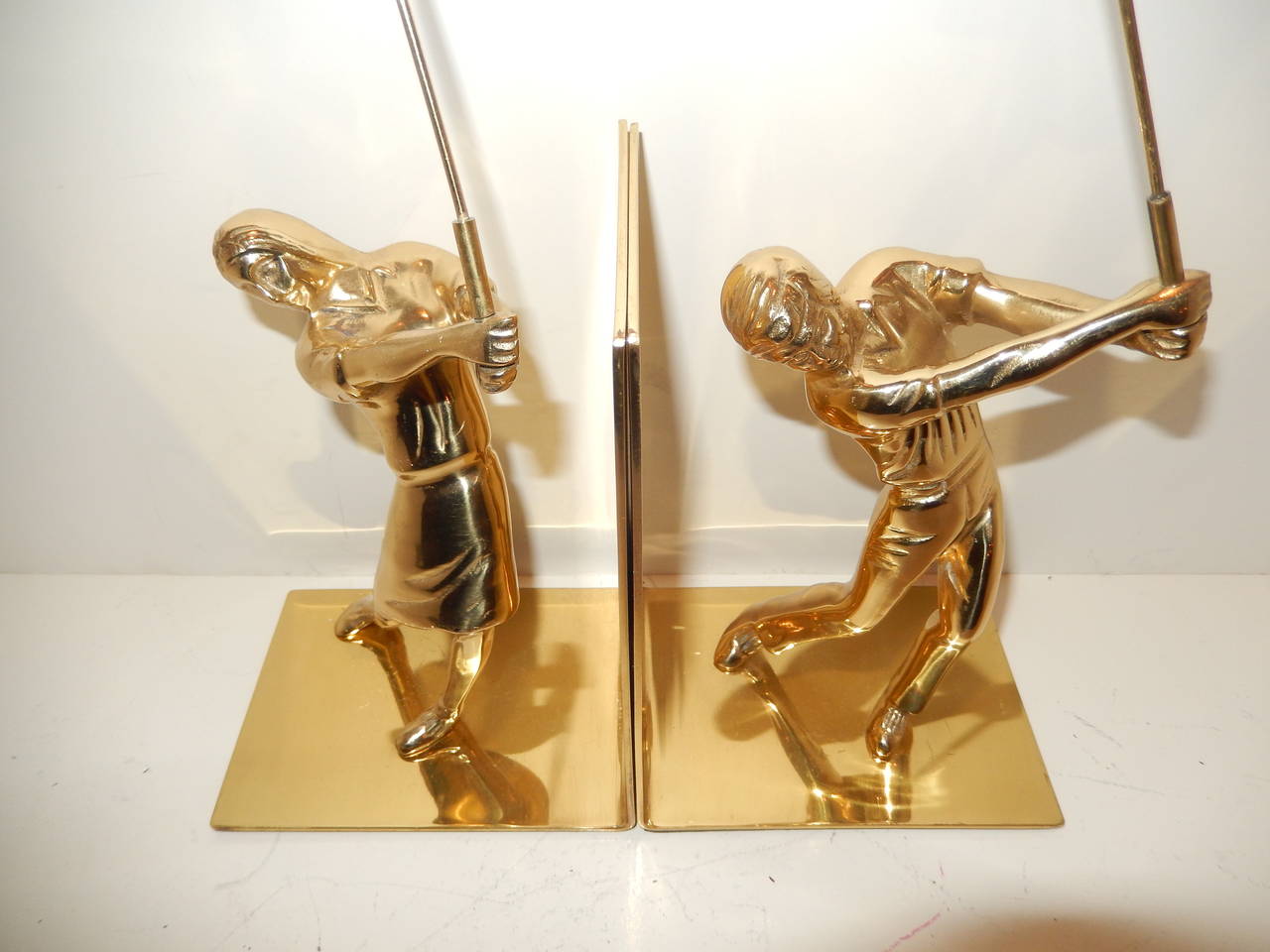 Mid-20th Century Pair of Art Deco Male and Female Golfers Bookends
