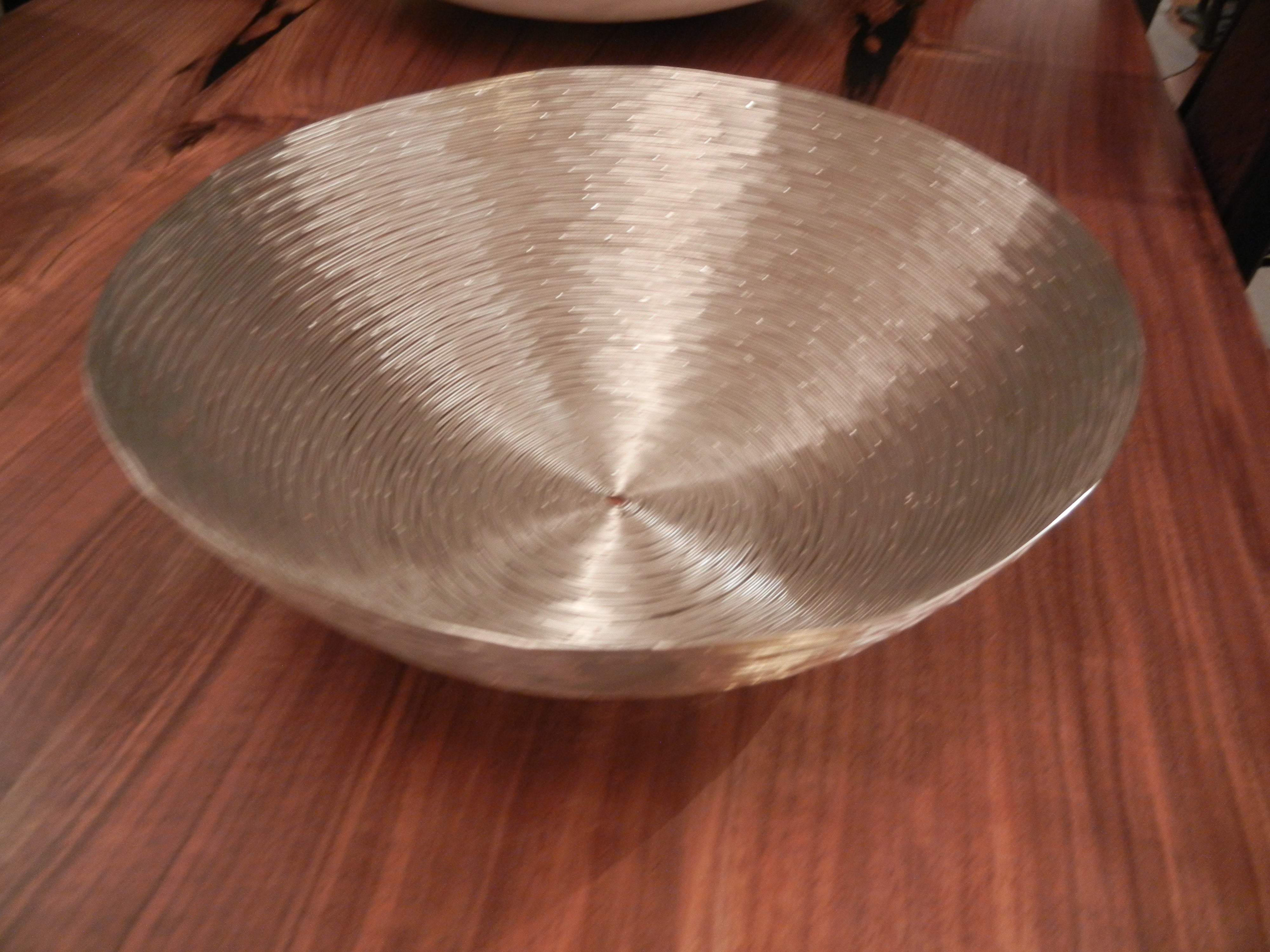A Large Hand Crafted Woven Metal Silver Bowl