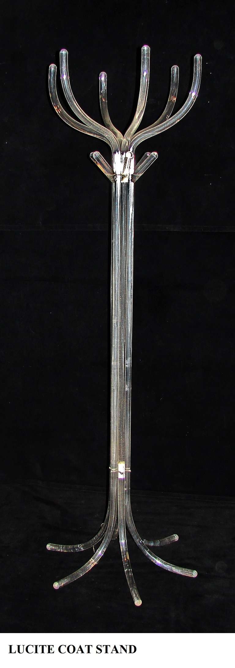 A rare Mid-Century Lucite Coat Stand with 6 arms at the top and four shorter arms just below for caps or umbrellas.