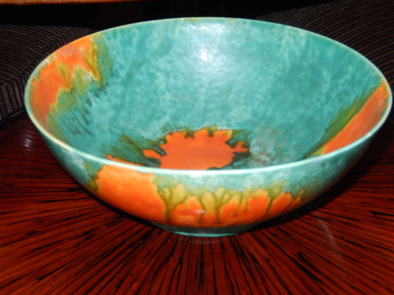 England 1920-1930 Crown Ducal Ceramic Bowl, from the blue and orange drip glaze collection. Bright deep colors of orange and blue are the result of extreme high heat firing, excellent condition, great for the collector of Art Deco and retro