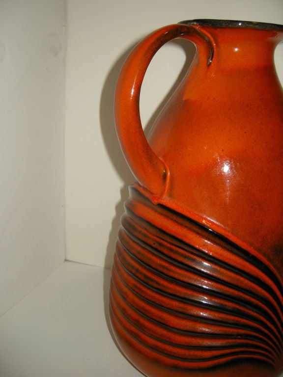 Rare tall Fohr Studio Craft vase in a wonderful burnt orange and black shadowing relief. Black interior,large strong handle.