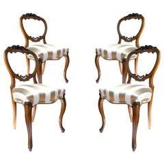 Four Elegant American Hand-Carved Antique Chairs