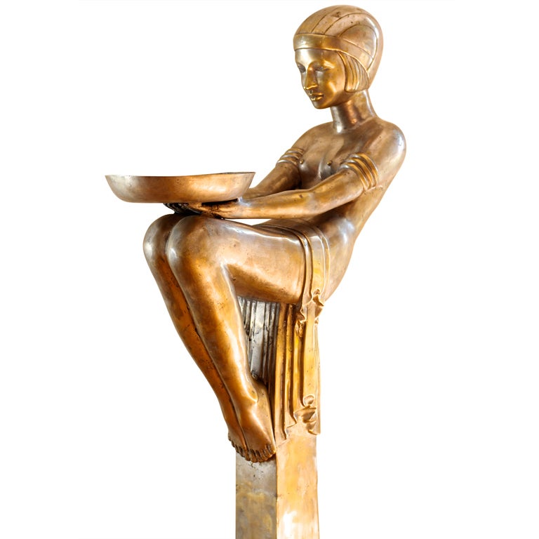 A Rare Art Deco Female Sculptural Figure and Pedestal