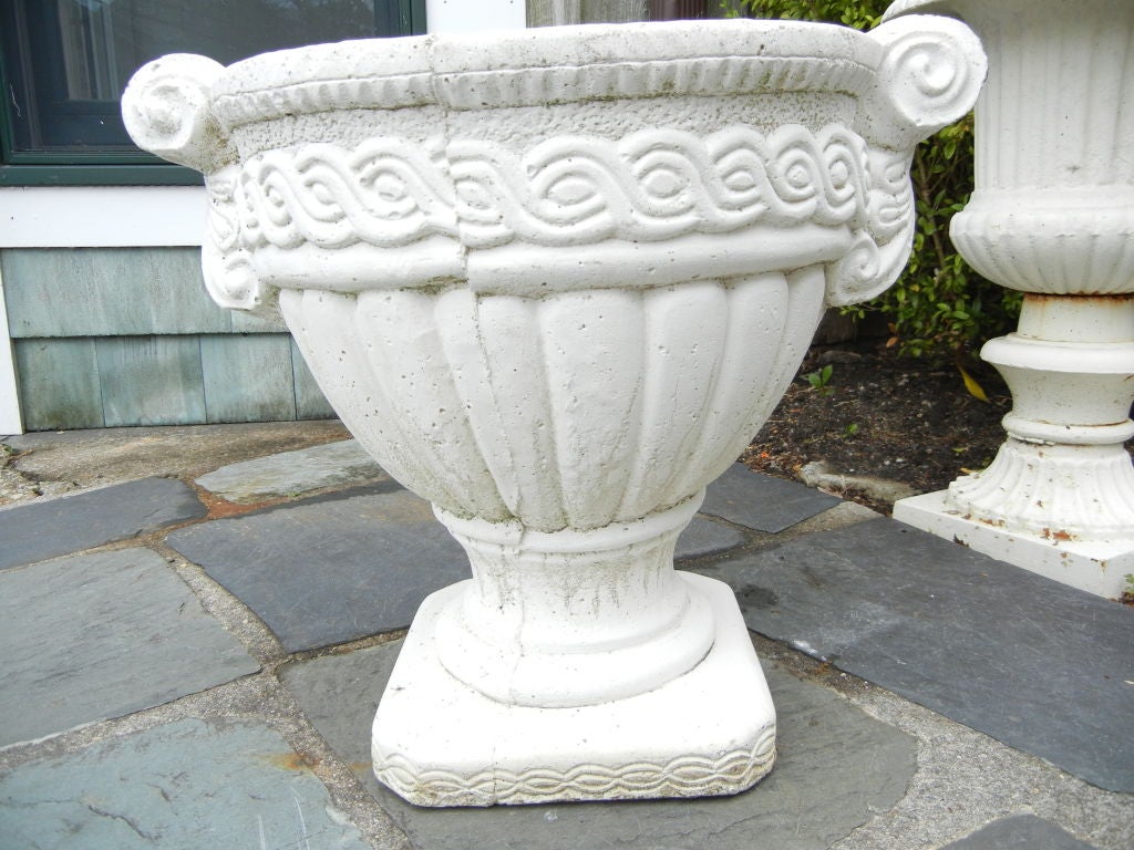 A wonderful, well detailed pair of French stone planters.