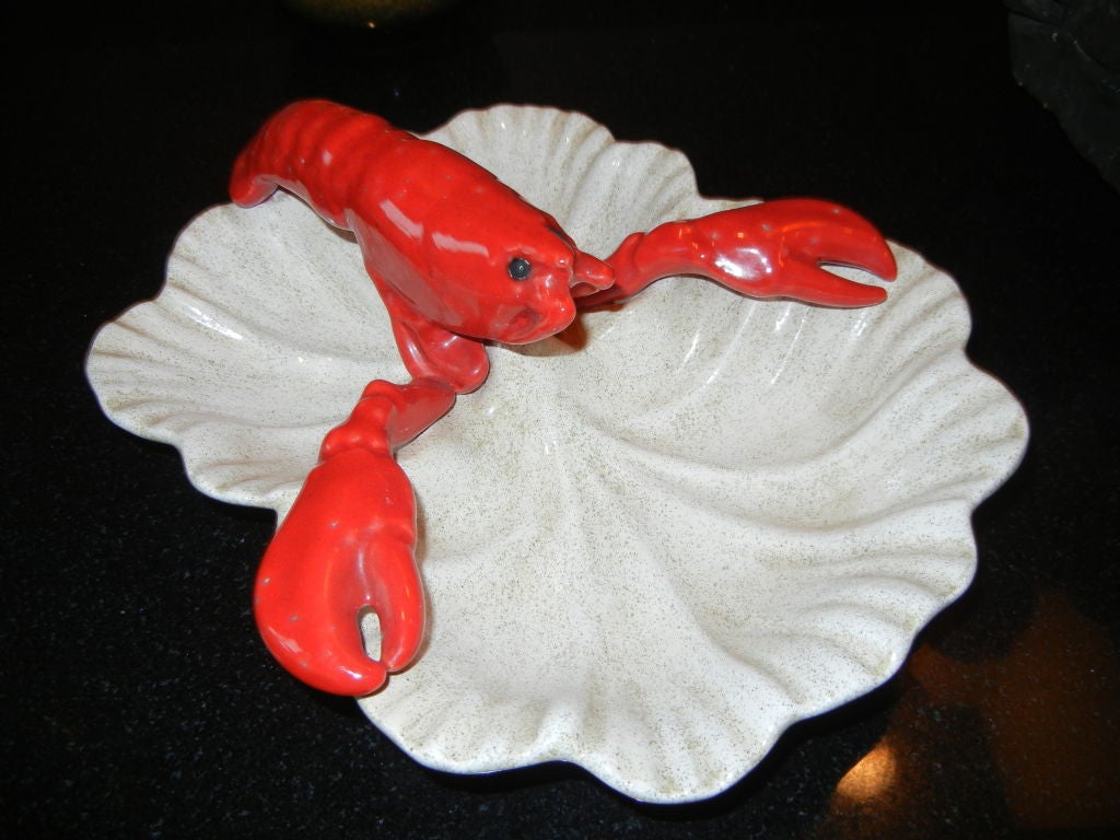 A fabulous ceramic lobster serving dish from the 50s.Lots of good detail on the lobster,great condition.