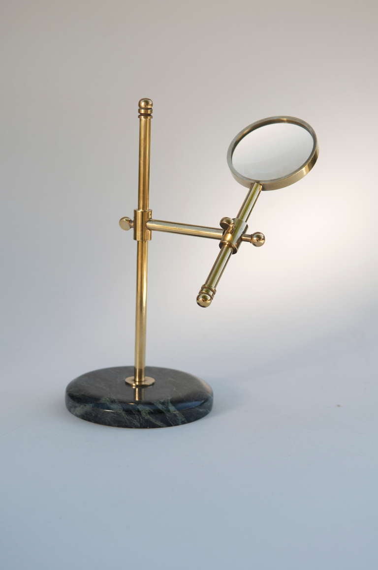 A charming gift for dad, husband or friend; a desk top brass and marble magnifying glass on stand. All hand crafted parts in solid brass. The diameter listed is of the actual glass, the base diameter is 5 inches.