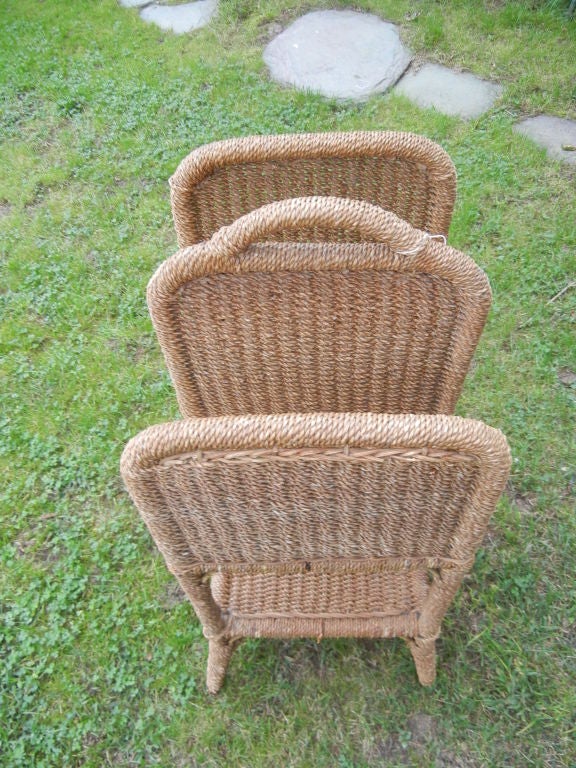 Tall, Bermuda Grass two-tiered magazine rack. Tight grass weave, excellent condition.