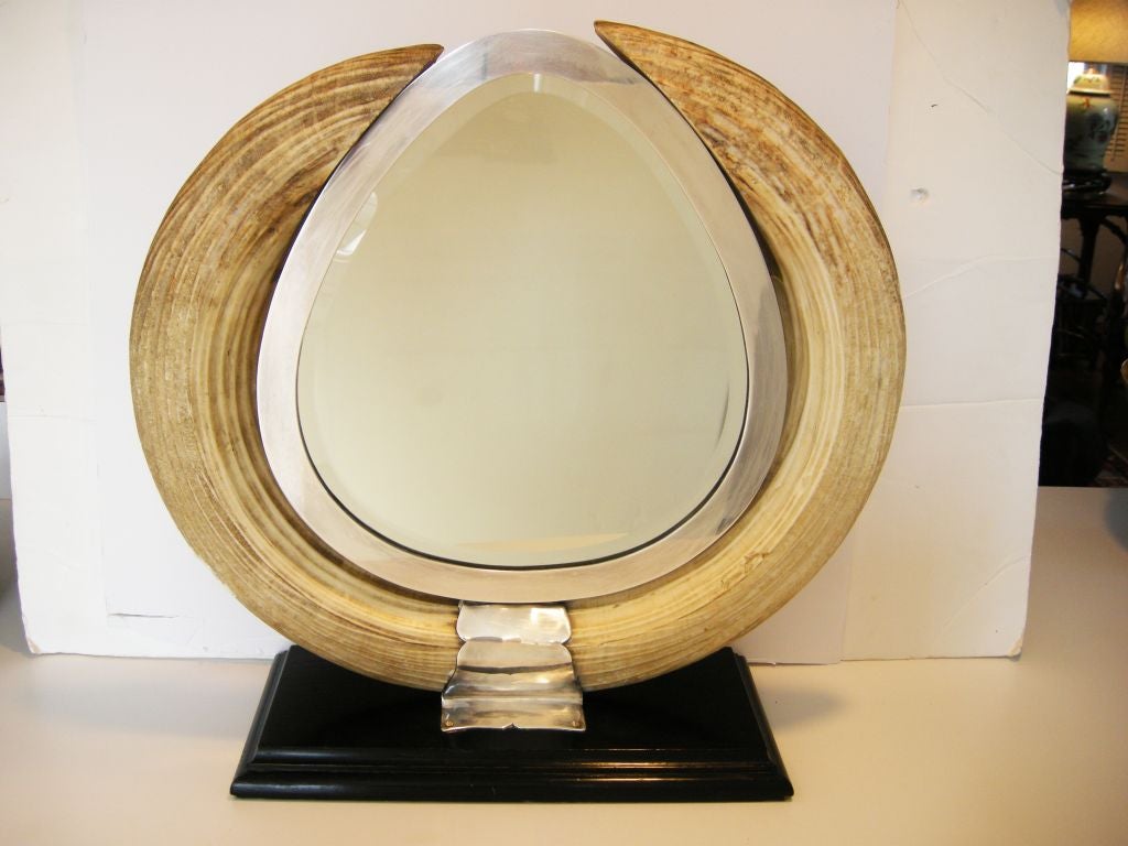 A Gentleman's Dresser Mirror. This extraordinary 1920-1930 Art Deco Roland Ward Trophy Hippo Teeth and Sterling Silver Mirror, was created by one of the finest and oldest taxidermy houses in the world: 