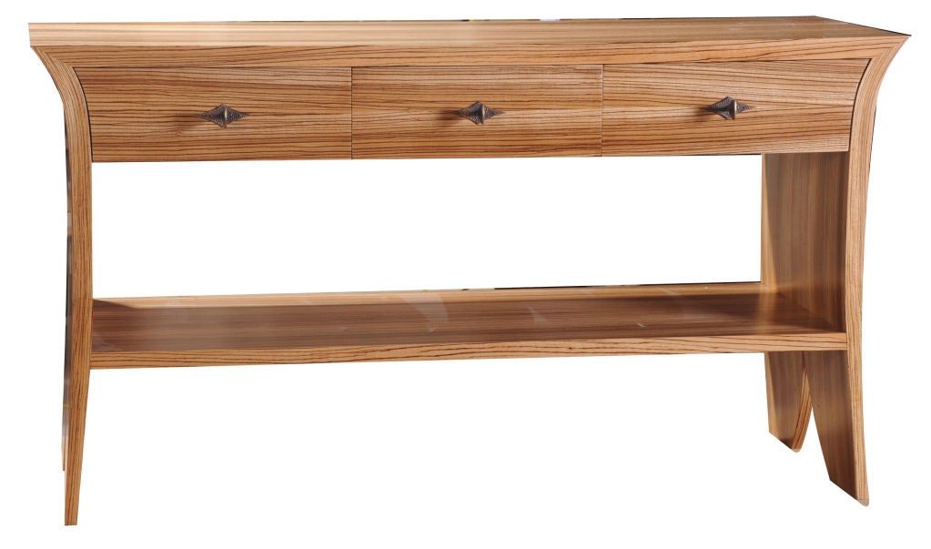 Handcrafted in the studio furniture movement style by internationally renowned studio Craft artist David N. Ebner. Shown in zebra wood; other woods available on request although prices will vary depending on wood choice. One large pull-out drawer,