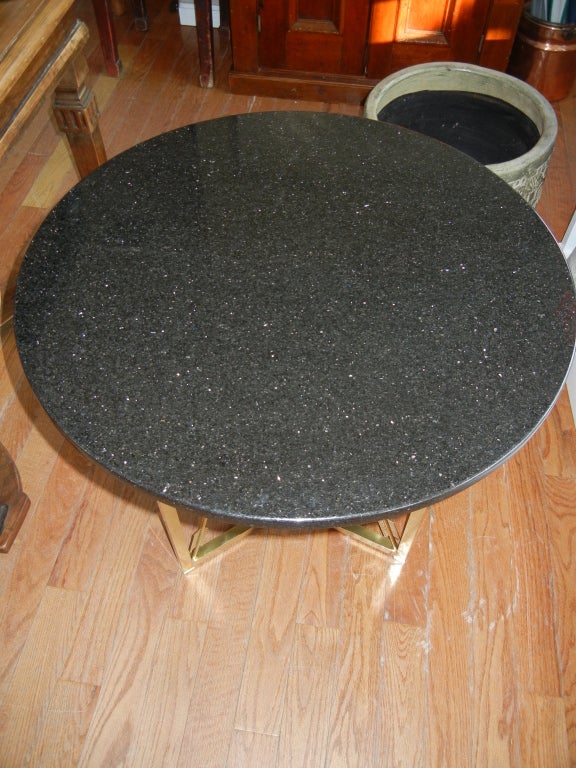 Classic Directoire Brass and Marble Side/End Table. Six crossed arrows in brass rectangle frames with a black speckled marble top.