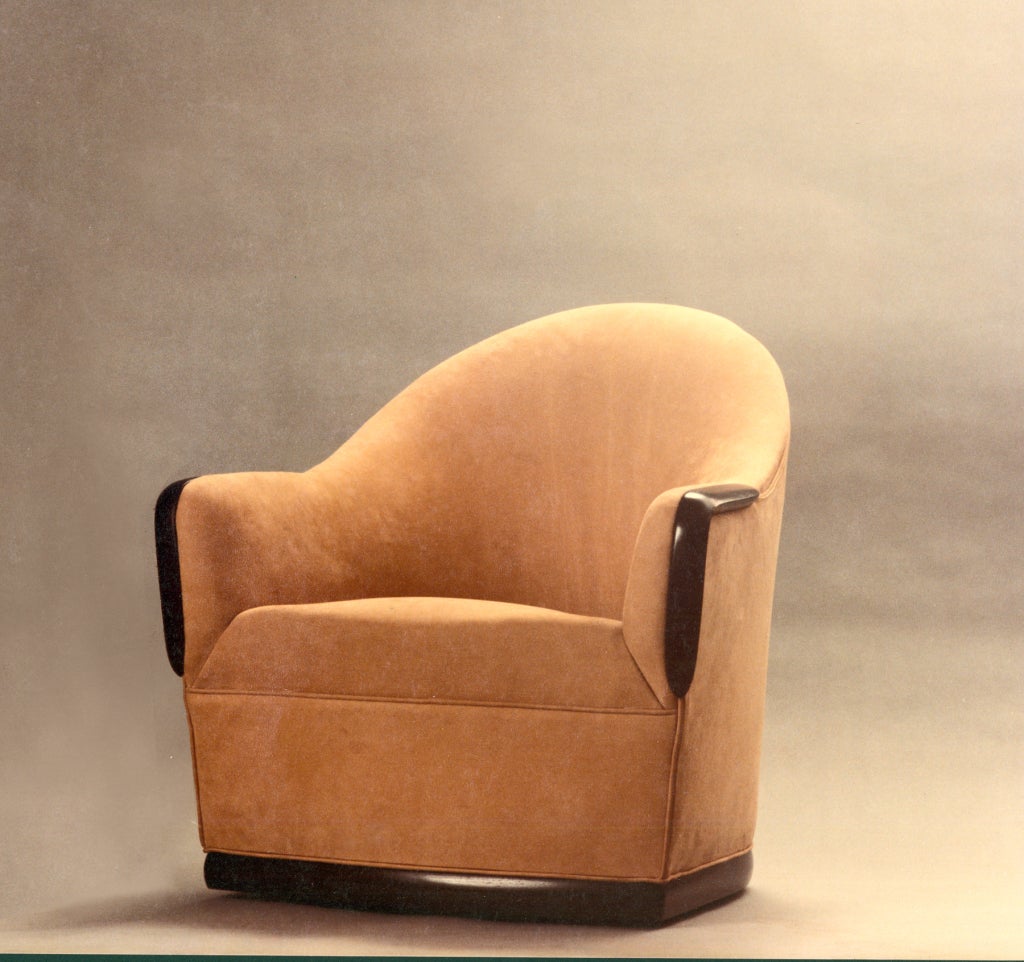 The Swivel Barrel Chair from American Studio Craft Artist David N. Ebner. Upholstered in an Italian Suede calf skin. Wenge wood frame,The swivel base is constructed of a heavy duty ball swivel, exceptional comfort and luxury guaranteed. Allow 8 to