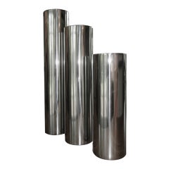 Three Towering  Cylinder Form Chrome Candlesticks