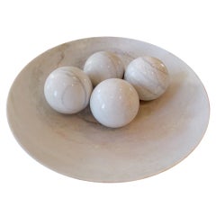 A Massive Studio Crafted White Marble Bowl & Four Marble Spheres