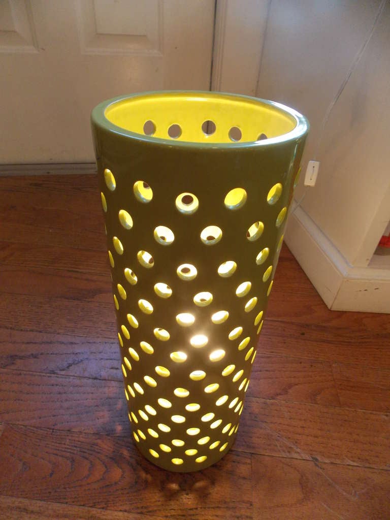 Tall chartreuse green pottery lamp. Retro style with open work, table top or floor light.