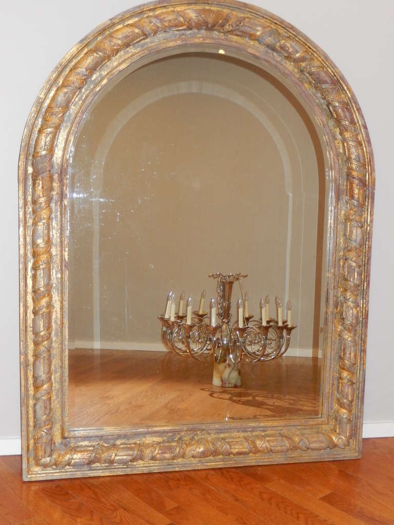 An Oversized French Arched Giltwood Carved Floor Mirror at ...