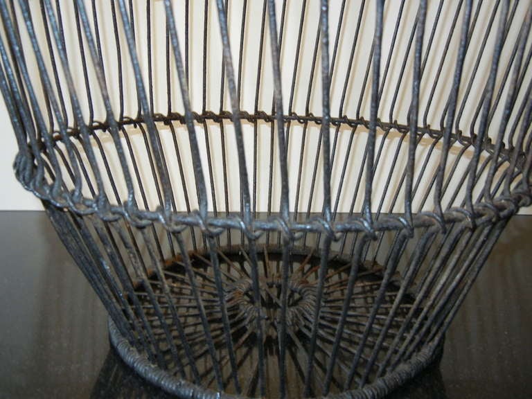 A large wire clam basket from Long Island's Great South Bay.
Good for magazines, towels, toys, plants and more.