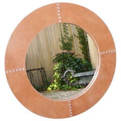 A Large Tan Leather Circular Mirror
