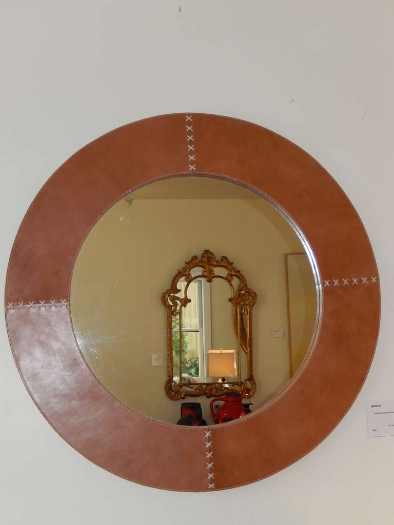 American A Large Tan Leather Circular Mirror