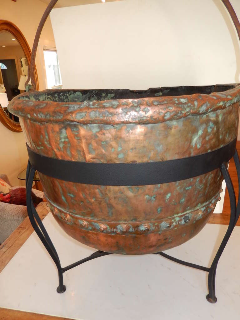 Primitive A Huge Copper Caldron and Wrought Iron Stand