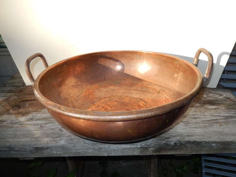 Made in the USA and in wonderful condition,this large candy bowl is made of 100% copper, with steel handles. The height listed is just of the bowl itself, the handles add 2 inches.