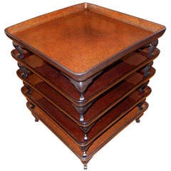 A Group of Five Oriental Stacked Serving Trays