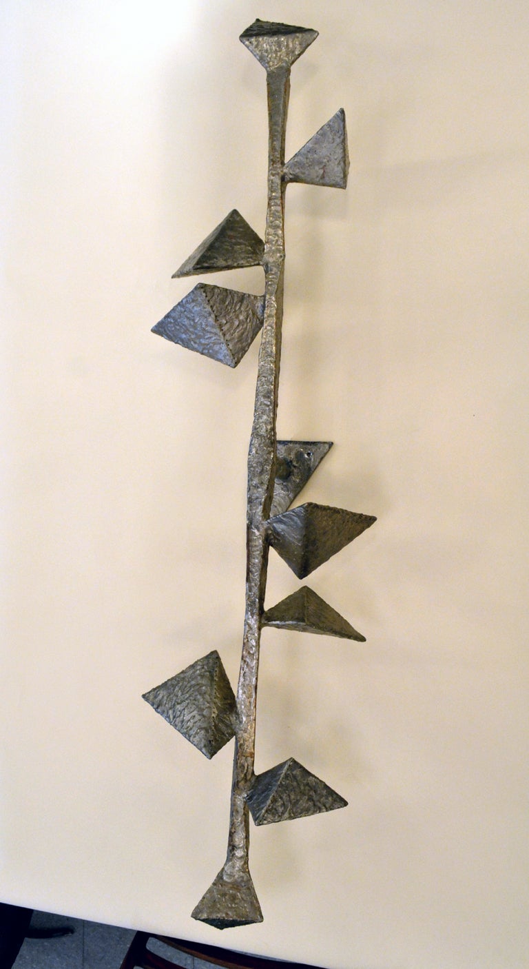 An extraordinary and only known example of a sprinkler made by Harry Bertoia, from the early 1960's. The sculpture is meant to be mounted upright. The structure is made of steel with a bronze melt-coat.
