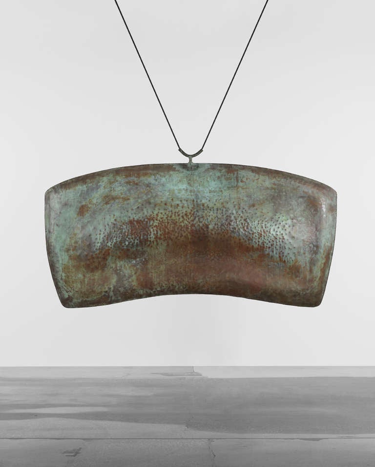 An extremely wonderful sounding gong by Harry Bertoia. The monumental size and wonderful surfacing make this a wonderful work by Bertoia. The surface patina is an extraordinary detail that adds a painterly effect to the gong.