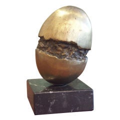 An Abstract Bronze Egg Sculpture