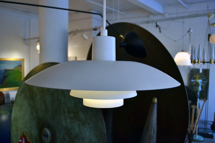 The famous Danish pendant lamp by Poul Henningsen.  Yes we have 200 of them in wonderful condition.  Typically they sell for $450-550.  We are offering them for $275 each.  Originating from a university in Copenhagen.