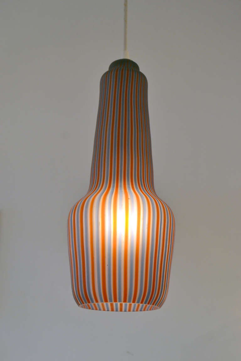 A wonderful and nicely striped color pendant by Venini, Italy. 